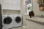 Laundry room with a sink