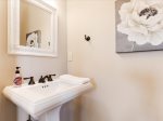 Half bathroom next to dining area