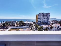 Beautiful New Condo! Just steps away from the beach