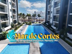 New Deluxe Condo just 5 minutes from the beach, beautiful community pool!