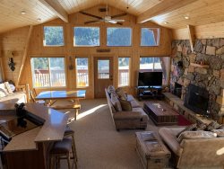  Just minutes from the ski lift.  Offers, two wood fireplaces, views, hot tub, Wi-Fi, dog friendly and borders national forest