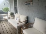 Front porch with beautiful new furniture