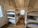 Adorable bunk house  Sitting area, half bath and so cute 