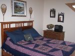 Upper level queen bedroom.