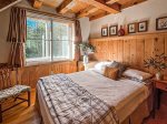 The lower level queen bedroom