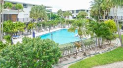 Sun Kissed Keys 2 bed 2.5 bath Condo with shared pool & first come dockage