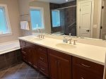 Main level ensuite bathroom with jacuzzi tub