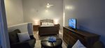 Queen bed in open upstairs area