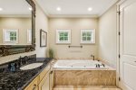 Tub with jets in master bath, relax after a full day at the beach