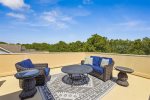 Lounge at this seating area on the roof