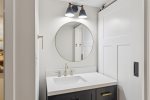 Sink & Stylish Mirror in Guest Bathroom