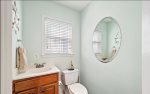 Half bathroom by kitchen