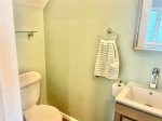 Half bathroom by kitchen