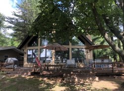 Wonderful chalet on Main Lake with great sandy beach!  No smoking and no pets allowed.  Please be aware owners do have dogs.