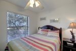 Guest bedroom with queen bed and en-suite bathroom