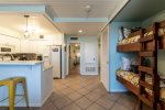 bunk beds, tile floors, pendant lighting, breakfast bar, stool, master suite entrance