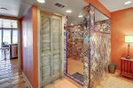 Walk in shower and privacy door to lavatory