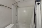 Primary bathroom with tub shower combination