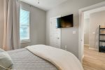 Guest bedroom 1 with a 42 streaming tv