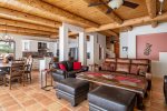 Living room opens into the kitchen
