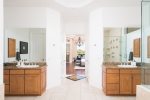 Dual sinks and vanities in master bathroom