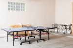 Ping pong table in the 4 car garage