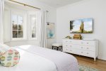 Wall mounted TV with cable and streaming capabilities