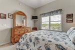 Guest room with Queen bed and TV