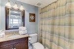Master bathroom with shower/tub combo.