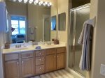 Dual vanities and Walk in shower in Master