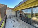 Large lanai with table and four chairs