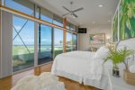 Primary Bedroom with floor to ceiling windows to wake up to a gorgeous view