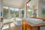 Primary bathroom with soaking tub and walk-in shower