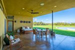 Large lanai connects the bedrooms and opens to the pool and yard