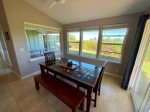 Dining room with plenty of natural light and sliding door to lanai