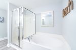 Master bath with soaking tub and shower