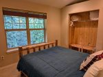 Master bedroom with lovely forest views. 