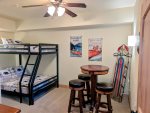 Twin over full size bunk bed in the Den Bedroom with a game table