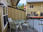 Private deck with table and chairs