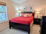 Queen size bed in the Master Bedroom with attached private bathroom
