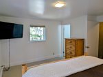 Smart TV and ensuite bathroom in the Master bedroom