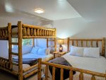 Queen over Queen bunk bed plus one more Queen bed in the Bunk room