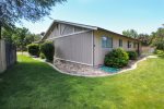 Spacious partially fenced backyard