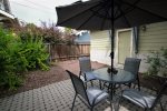Back patio with access to the separate garage