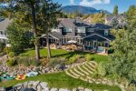 Aerial photo of home and yard.  Kayaks & paddle boards included.