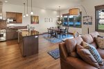Open floorplan showing kitchen, dining and living areas.
