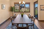 Dining table with seating for 6, plus 2 barstools for additional seating