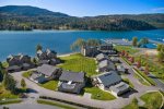 Aerial view of townhome and waterfront neighborhood