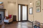 Covered, private entryway with coat closet