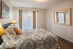 Second bedroom opens up to a small garden area